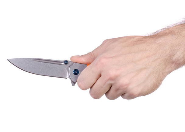 Knife folding with orange handle in hand - Zdjęcie, obraz