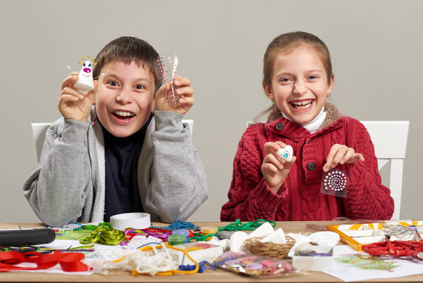 Children make crafts and toys, handmade concept. Artwork workplace with creative accessories. - Fotoğraf, Görsel