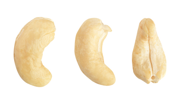 cashew pähkinät eristetty valkoisella pohjalla. ylhäältä. Litteä pano. Aseta tai keruu
 - Valokuva, kuva