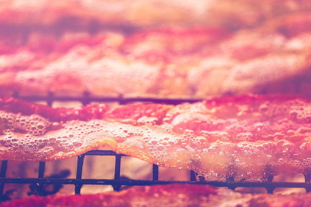 Bacon reepjes dicht omhoog - Foto, afbeelding