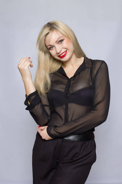 Beautiful sexy pretty girl wear black suit blouse and pants lady boss business woman skin tan long blonde hair party style fashion cloches studio grey background. - Foto, imagen