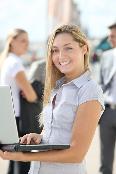 Blond businesswoman with laptop computer - Foto, Imagem