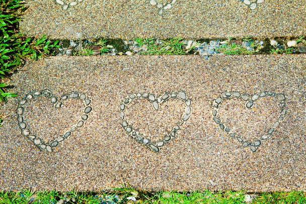 Slabs, pavement, cement stone with heart shapes - Photo, Image