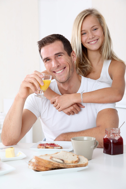 Father and daughter having breakfast - Fotografie, Obrázek