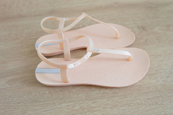 Pink Pastel Sandal Top View. Pair of Woman is Sandals Isolated (Footwear) on Wooden Background Great For Any Use. - Фото, зображення