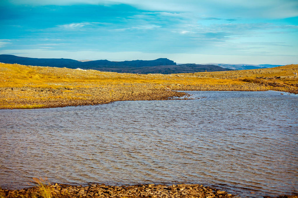 Arctic wilderness, tundra, minimalistic landscape with Mountain river. Nature Norway - Φωτογραφία, εικόνα