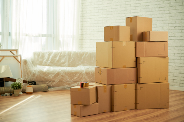 apartment with carton package boxes for moving  - Photo, Image