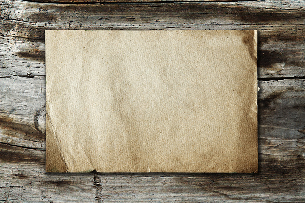 Vintage paper on wood texture - Photo, image