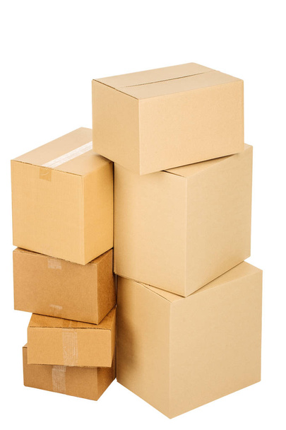 Pile of cardboard boxes on a white background - 写真・画像