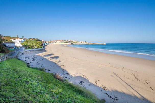 Comillas Beach with blue sky in Cantabria - Photo, Image
