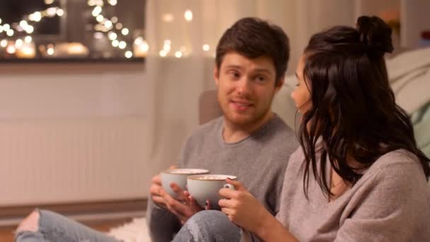 happy couple drinking cacao at home - Video