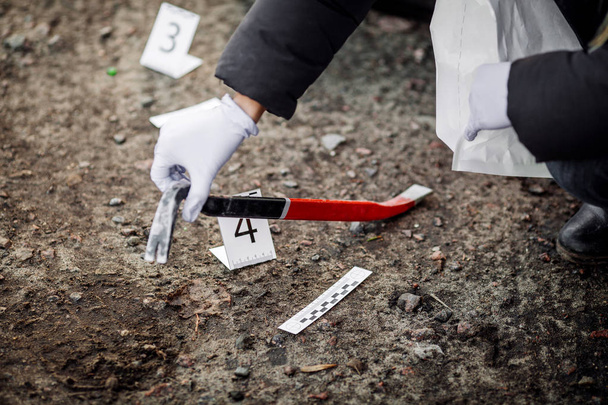 Crime scene investigation - collecting evidence - Foto, afbeelding