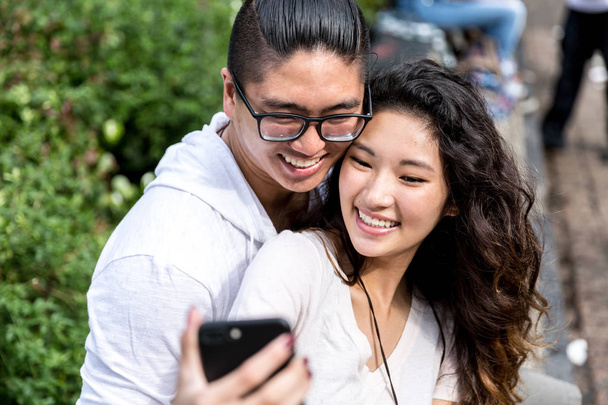 Asian Couple Taking a Selfie - Photo, Image
