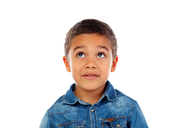 Забавный маленький африканский мальчик в джинсовой рубашке на белом фоне
 - Фото, изображение