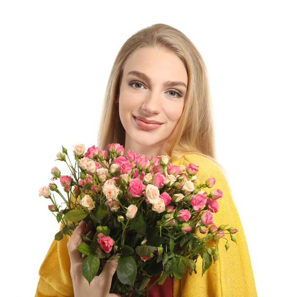 Beautiful young woman with bouquet of roses on white background - Fotoğraf, Görsel