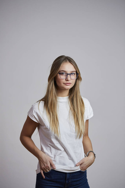 Portrait of girl in glasses and white t-shirt - Фото, зображення