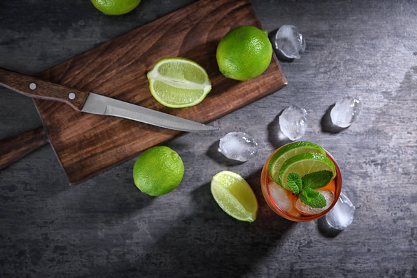 Composition with Cuba Libre cocktail on table - 写真・画像