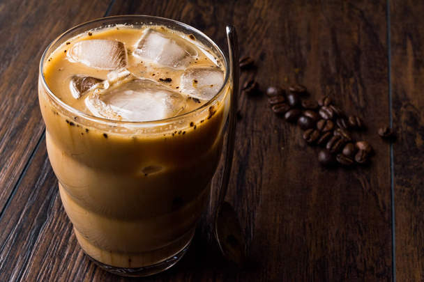 Instant Cold Coffee with Milk, Ice, Spoon and Coffee Beans. - Photo, Image