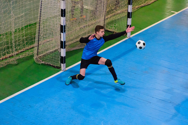Football goalkeeper on goal, field, Futsal ball field in the gym indoor, Soccer sport field - Φωτογραφία, εικόνα