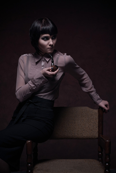 beautiful girl smoking pipe - Foto, Bild