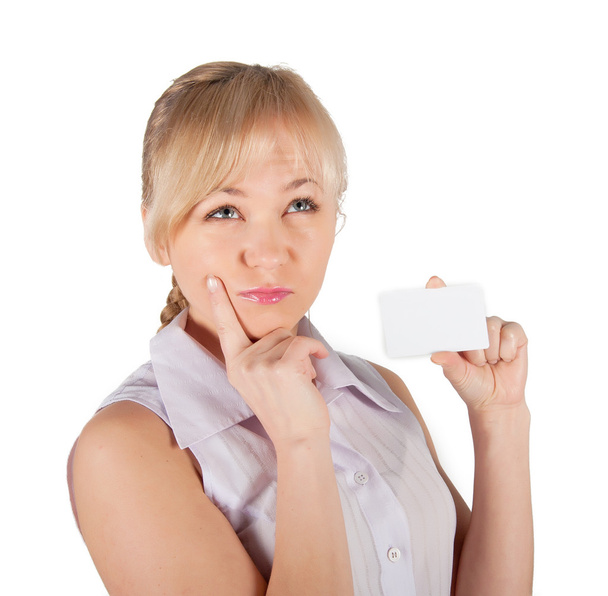 A woman holds in her hand a plastic card for purchases. on a white background - Photo, image