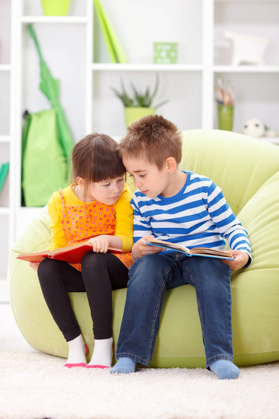 Little girl and boy reading - Φωτογραφία, εικόνα