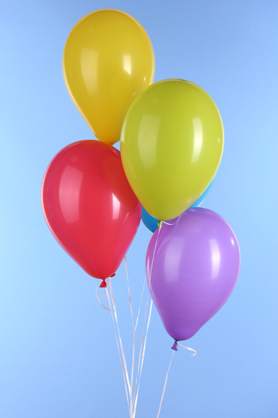 colorful balloons on blue background - Foto, Imagen