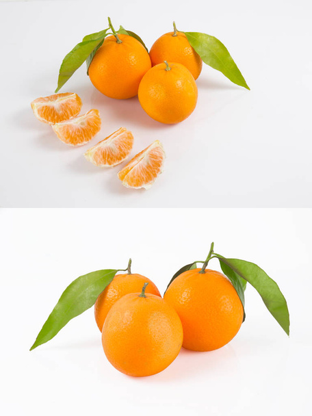 Na białym tle zbierania owoców cytrusowych. Całej mandarynki lub owoce mandarin orange i obrane segmentów na białym tle na białym tle ze ścieżką przycinającą - Zdjęcie, obraz