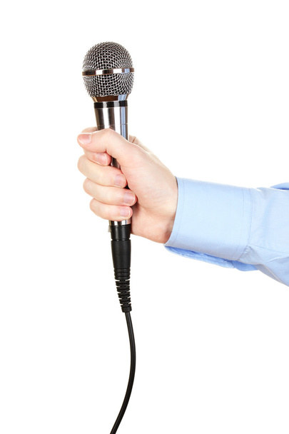 Male hand with microphone isolated on white - Foto, imagen