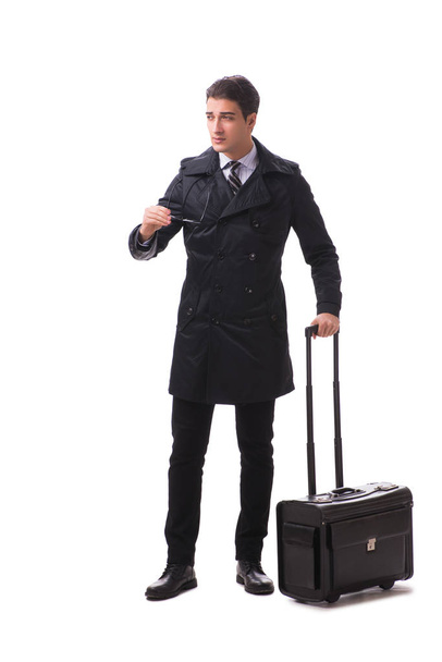 Молодой бизнесмен с чемоданом готов к деловой поездке на белом - Фото, изображение