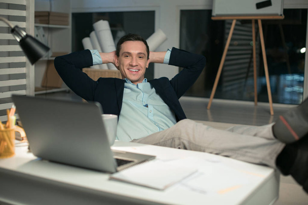 Cheerful male real estate agent receiving order - Photo, image