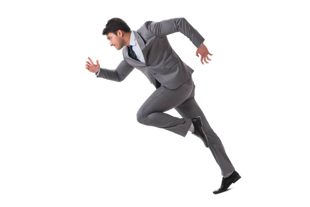 Молодой бизнесмен бежит вперед изолированный на белом
 - Фото, изображение