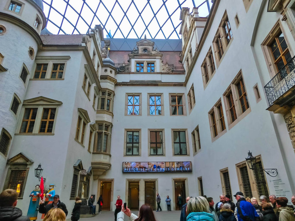 Dresden, Germany - December 31, 2017: Visitors admiring the old paintings in Zwinger, Dresden, Germany - 写真・画像
