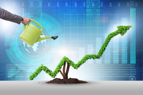 Businessman in investment concept watering financial line chart - Photo, Image