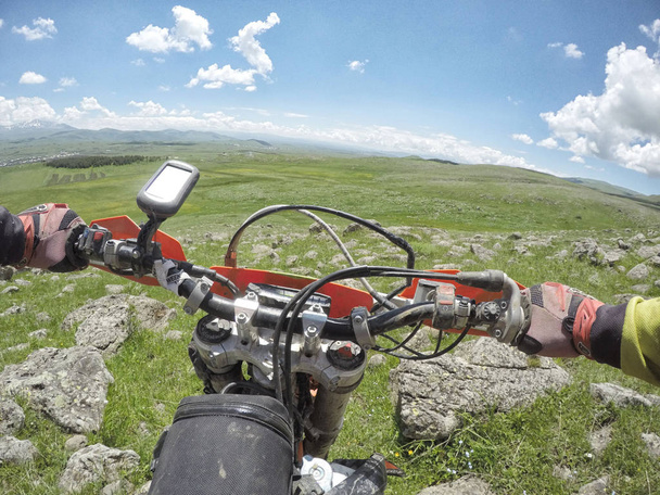 Enduro journey with dirt bike high in the mountains - 写真・画像
