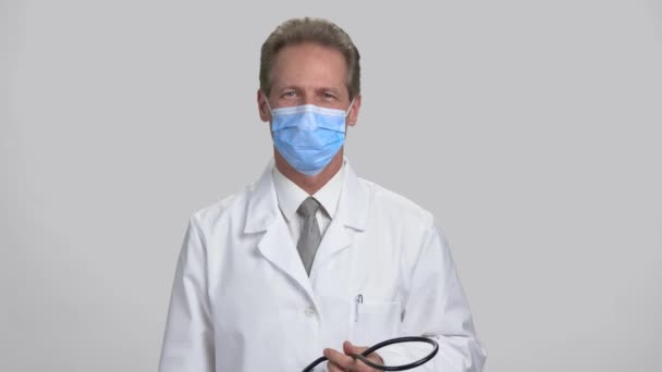 Portrait of a professional skillful doctor wear stethoscope. - Video, Çekim