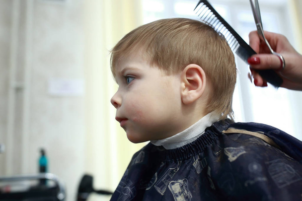 Kid in barber shop - Photo, Image