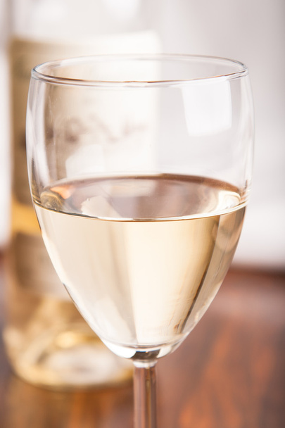 glass and bottle white wine - Fotó, kép