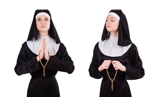 Nuori nunna eristyksissä valkoisella taustalla
 - Valokuva, kuva
