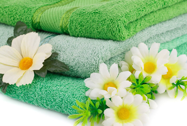 Handtücher und Blumen - Foto, Bild
