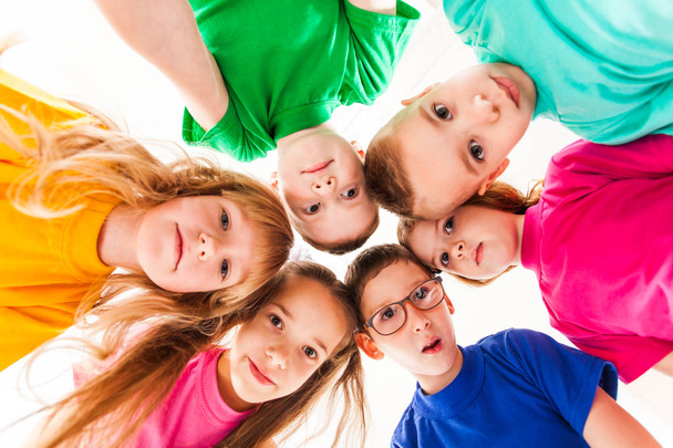 Kids faces in a round - Foto, Bild