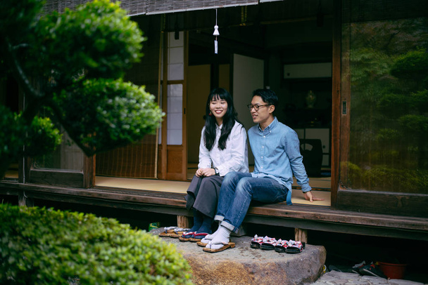 Young japanese couple spending time in their house - Fotoğraf, Görsel