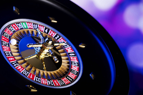 Casino theme. Gambling games. Closeup of the roulette wheel. - Photo, Image