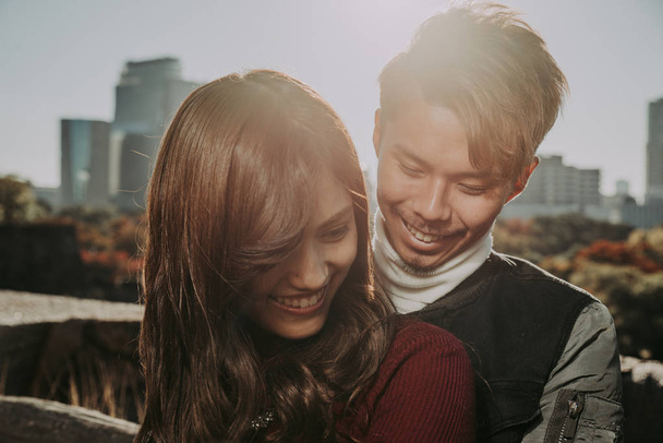 Happy couple spending time together in Osaka - 写真・画像