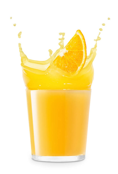glass of splashing orange juice - Foto, afbeelding