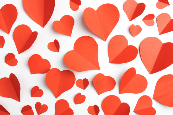 Red paper hearts isolated on white - 写真・画像