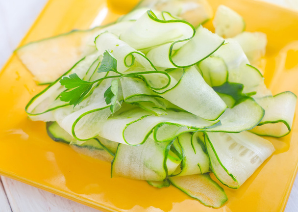 Fresh salad with fresh cucumber and parsley - Foto, imagen