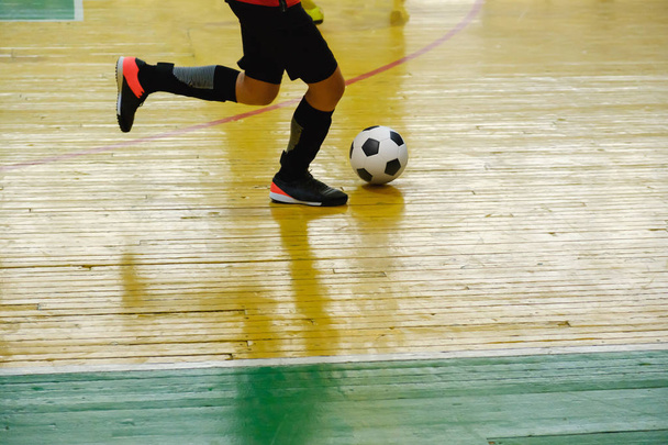 Children teen training soccer futsal indoor gym. Young boy with soccer ball training indoor football. - Φωτογραφία, εικόνα