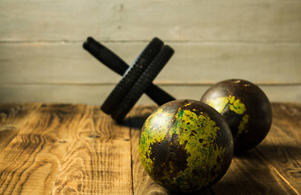 sports equipment on a wooden bacground - Photo, Image