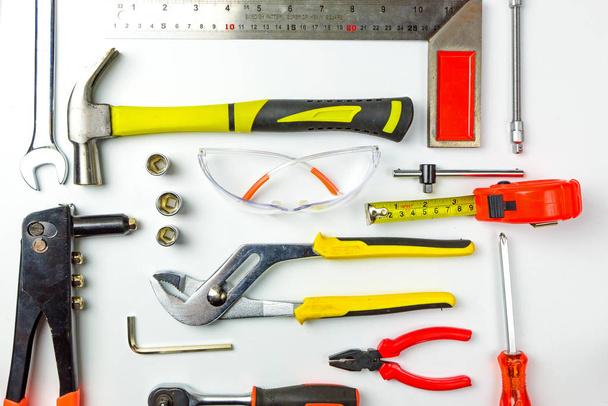 Set of construction tools on white background as wrench, hammer, - 写真・画像